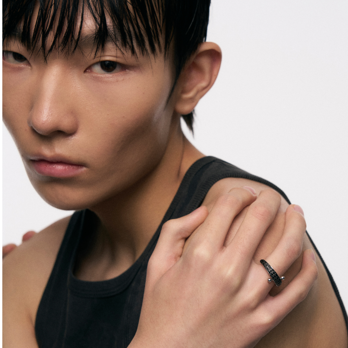 Snake Pattern Ring with Piercing Detail