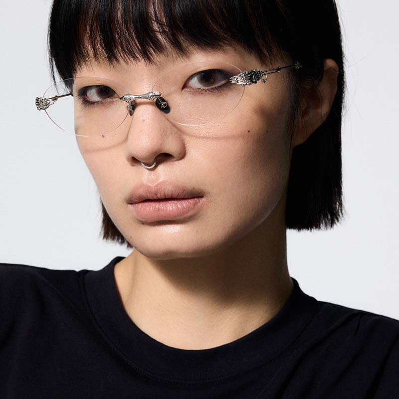 Skeletal Piercing Rimless Sunglasses (Clear Photochromic)