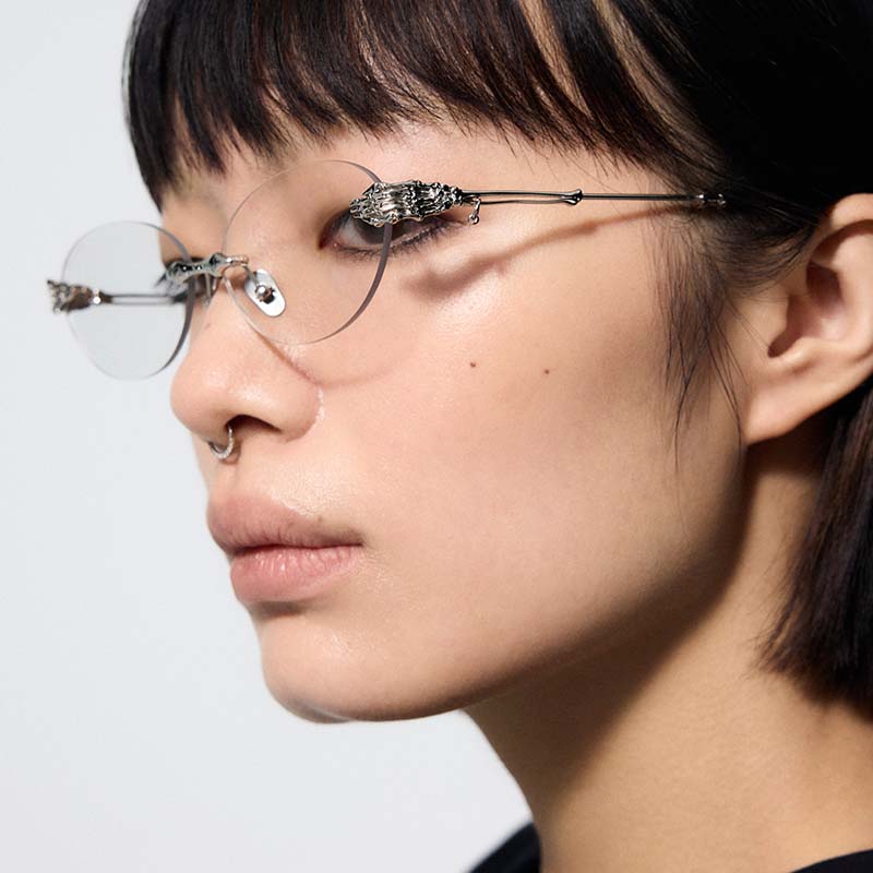 Skeletal Piercing Rimless Sunglasses (Clear Photochromic)