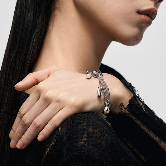 Multi-Chain Teardrop Pearl Bracelet