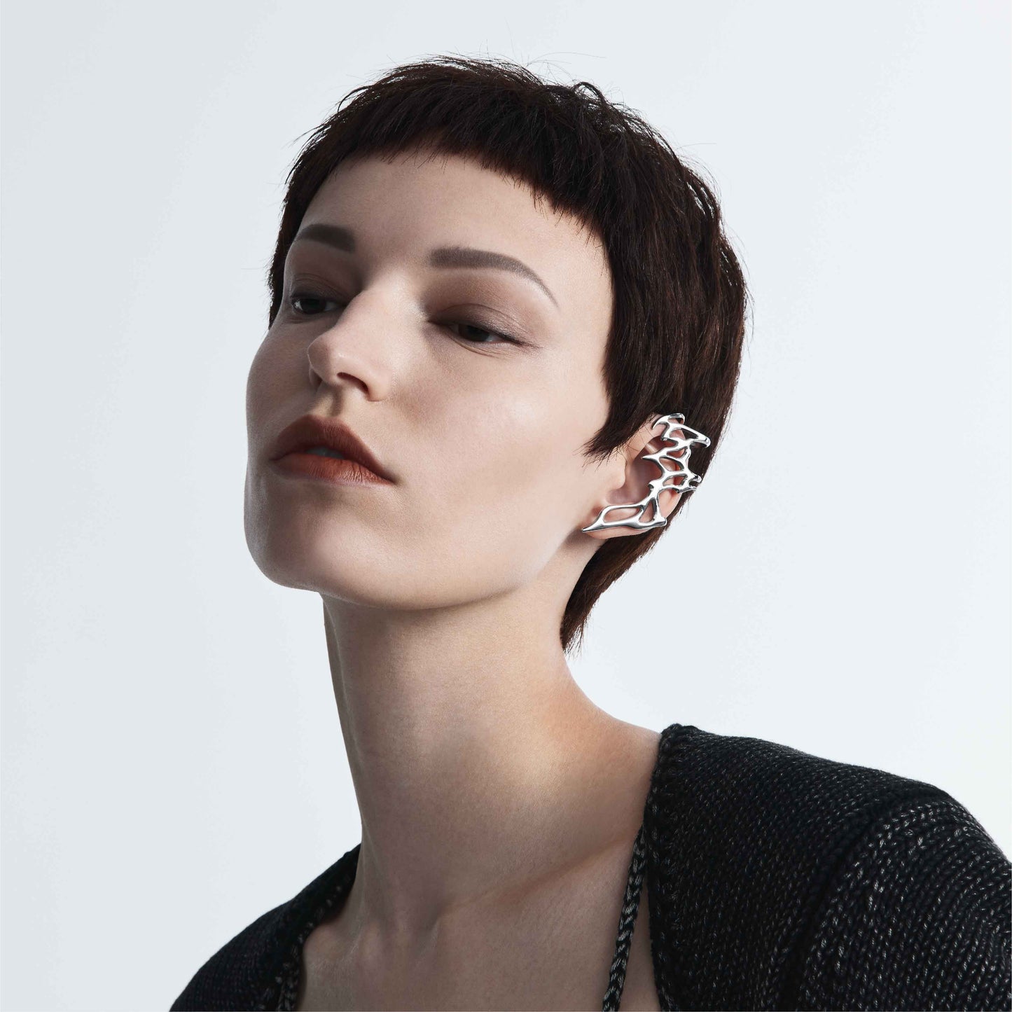 Intrusion Hollow Fluid Cuff Earring